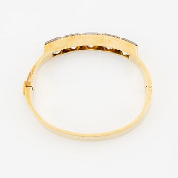 Wiwen Nilsson, a bracelet, 18K gold with step-cut rock crystal, Lund 1947.