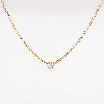 Tiffany & Co, Elsa Peretti, an 18K gold necklace with a ca. 0.05 ct diamond.