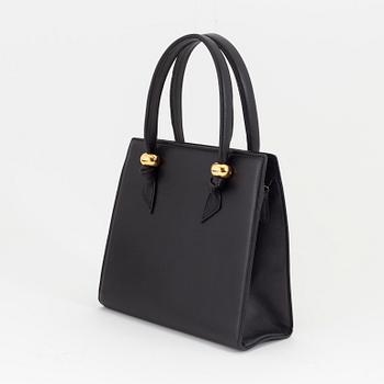 Bally, a black leather handbag.