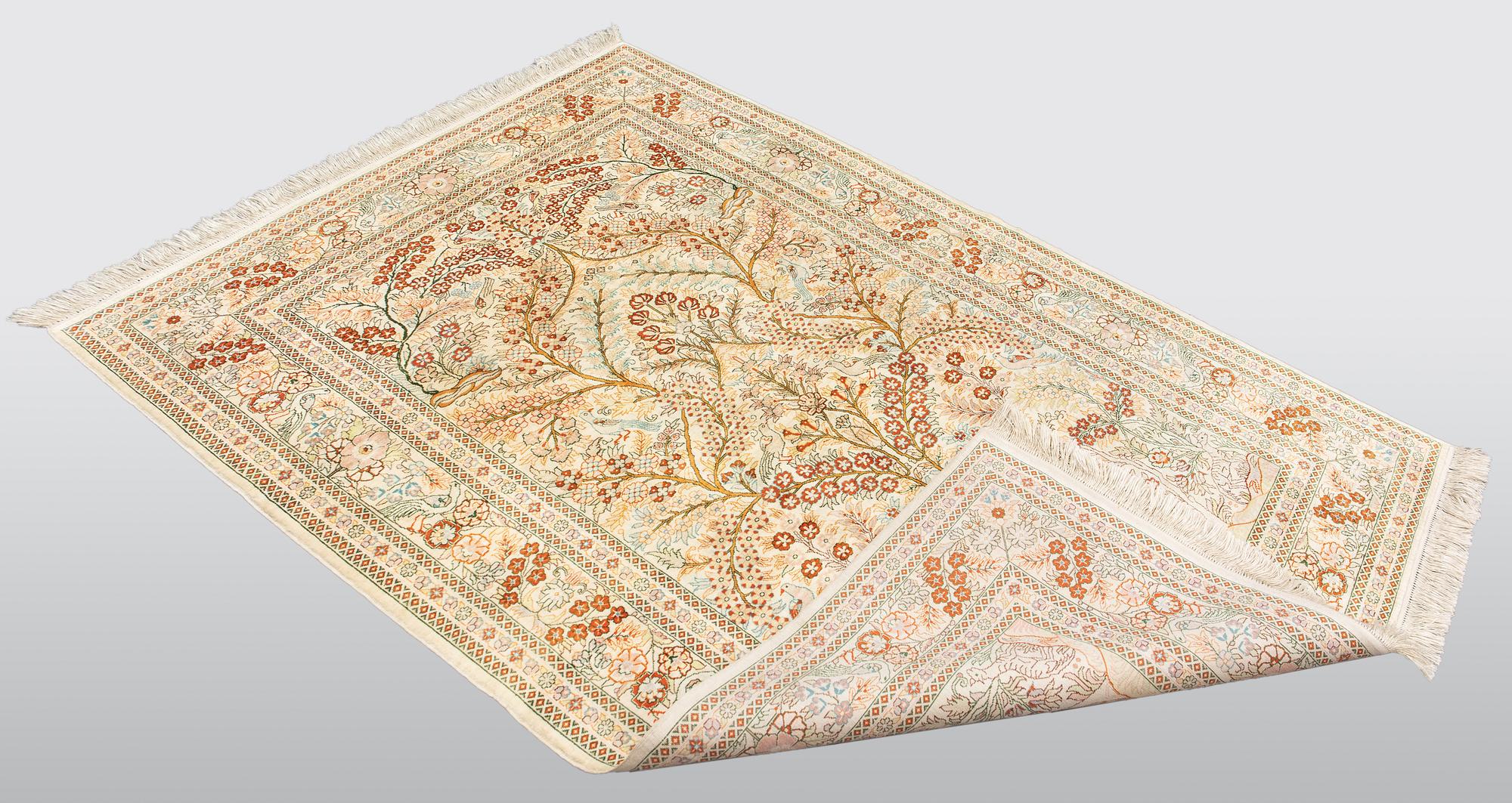 A rug, Oriental silk, ca 154 x 92 cm.
