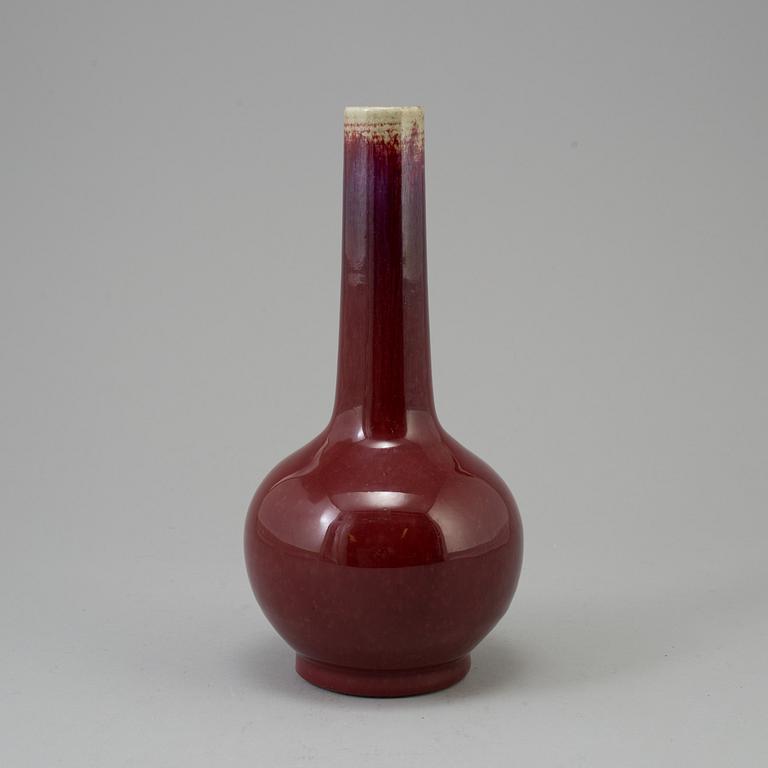 A Chinese copper red glazed bottle vase, presumably late 19th century.