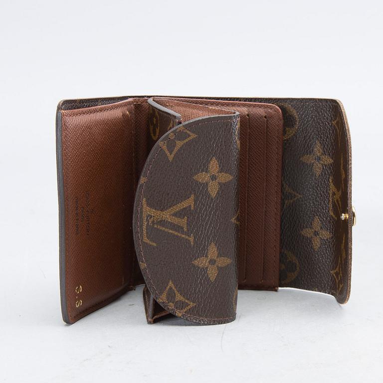 An 'Helene' wallet by Louis Vuitton.