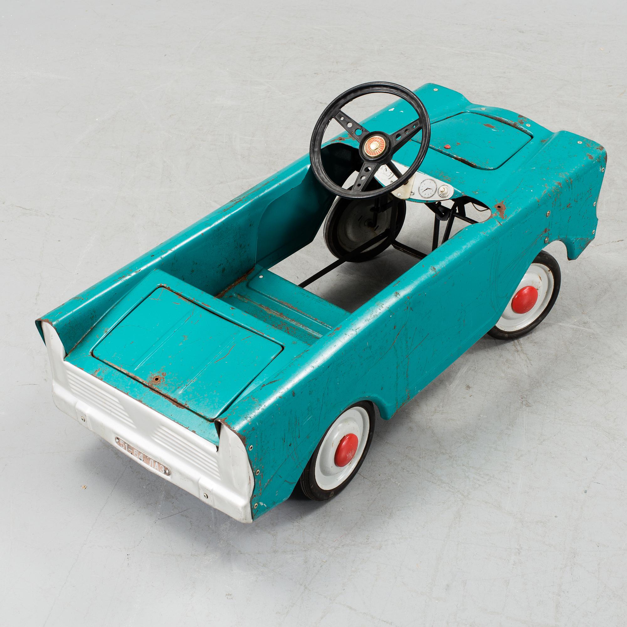 A toy car, mid 20th century.