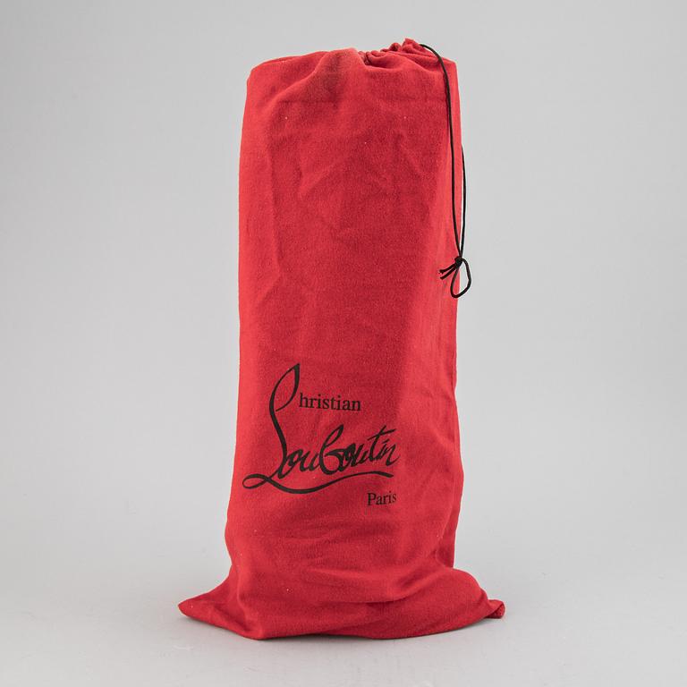 CHRISTIAN LOUBOUTIN, a pair of leather boots, size 37.