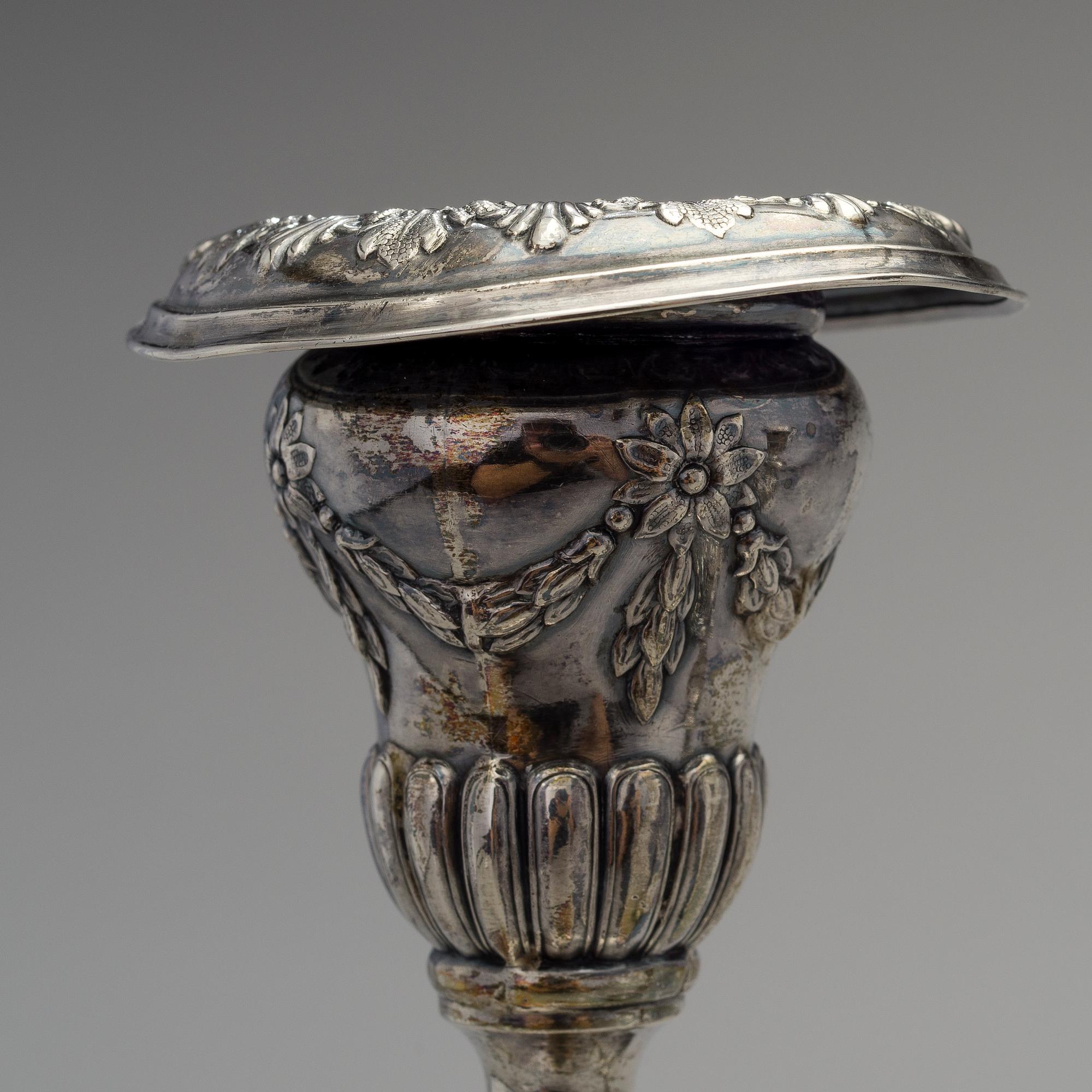 A pair of silver candlesticks by Teodor Werner & son, Warsaw 1876-1896. Weight 700 g.