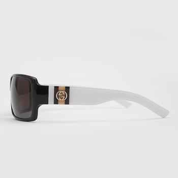 SOLGLASÖGON, Gucci.