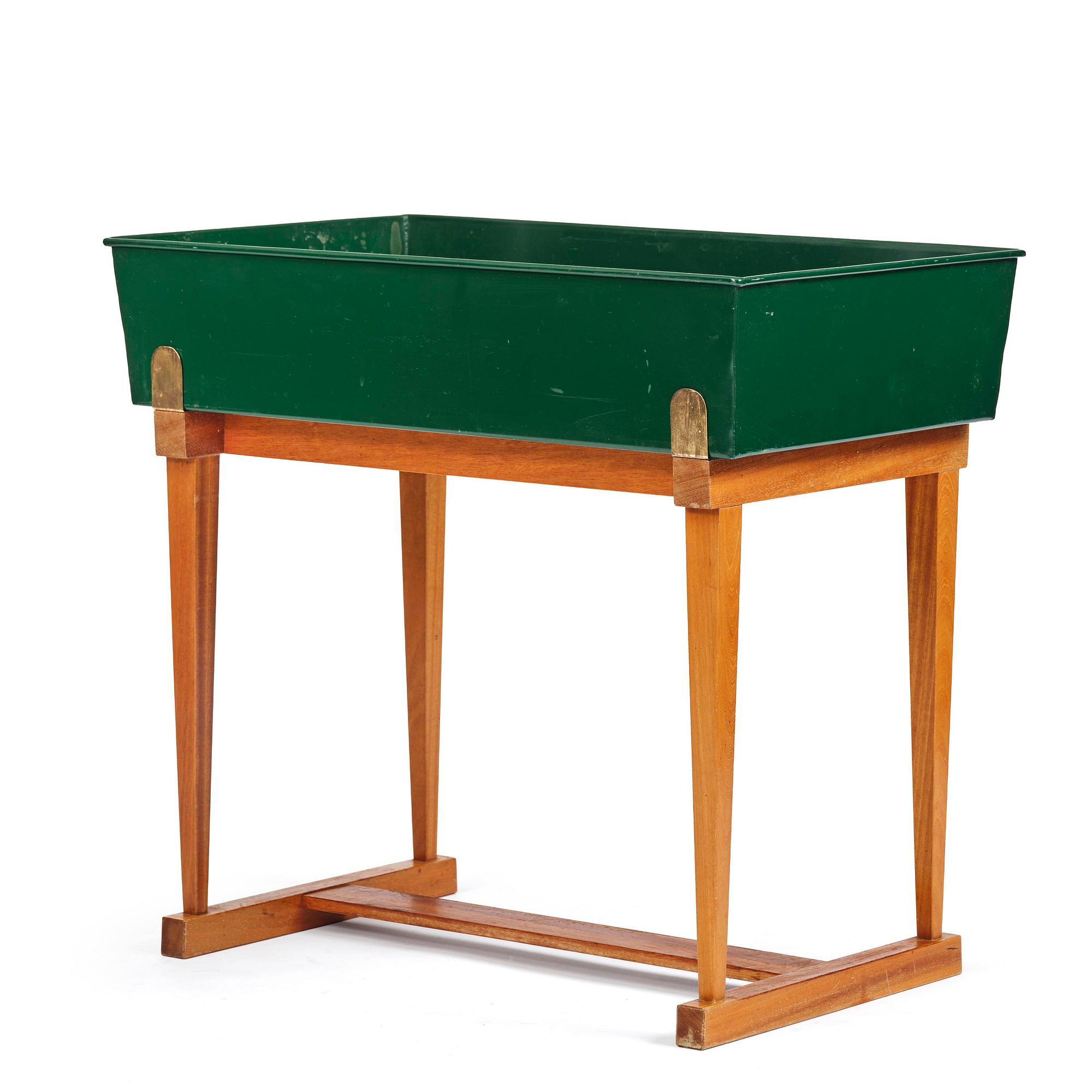 Josef Frank, a rare flower table with green lacquered box model B 2084, Firma Svenskt Tenn, 1950-60s.