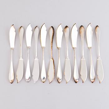 A 1920s 88-piece set of silver cutlery and 12 knife handles, Warsaw Poland.