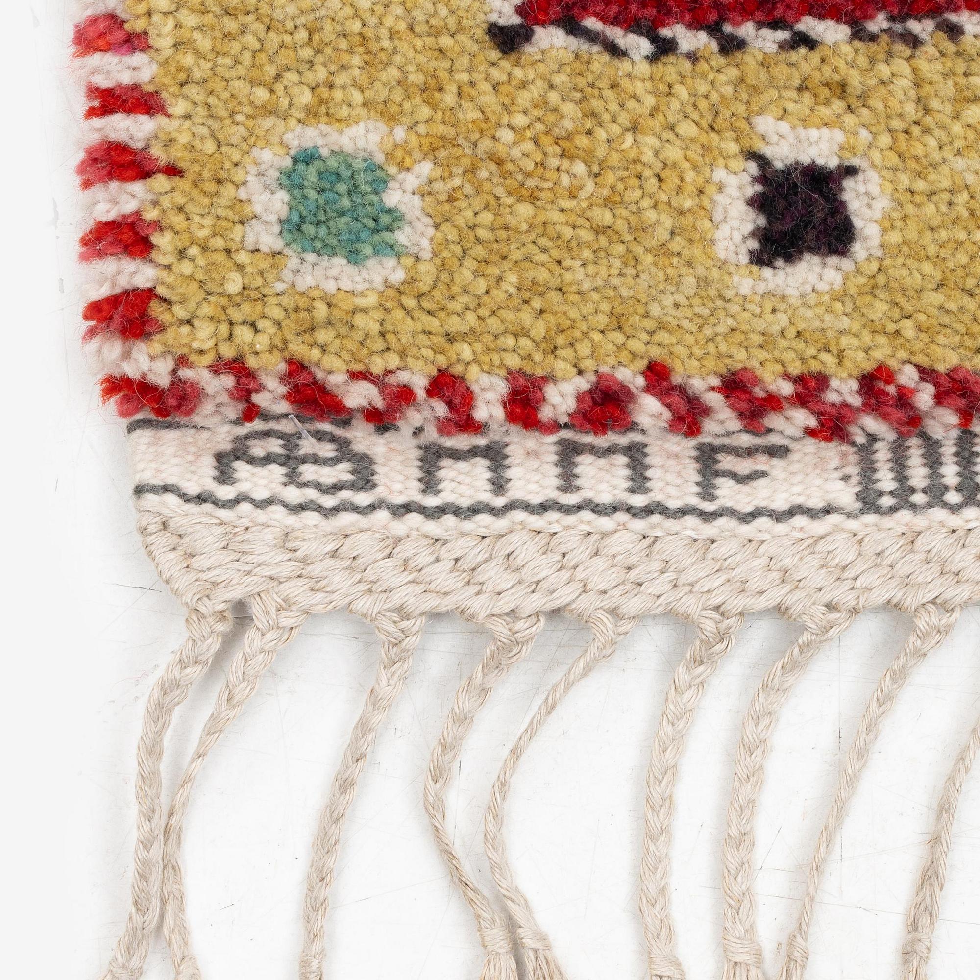 Barbro Nilsson, a 'Rabatten röd' carpet, knotted pile, 266 x 195 cm, signed AB MMF BN.