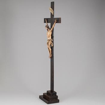 A painted wood crucifix, 18th/19th century.