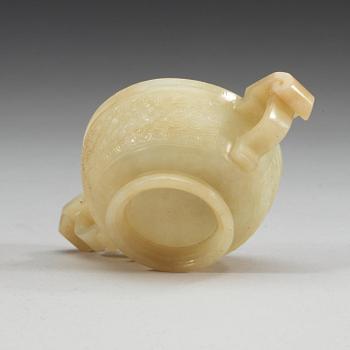A carved nephrite cup, China.