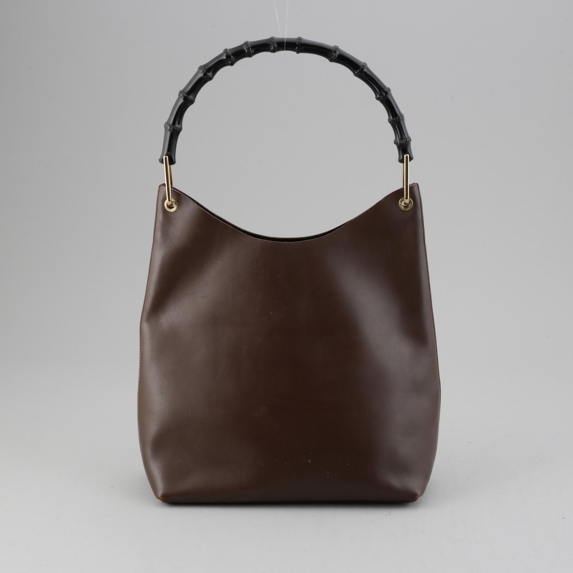 Gucci, a leather bag.