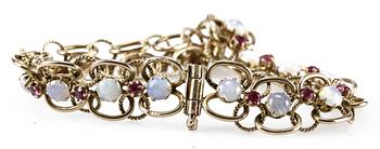 ARMLÄNK, 14 K guld, rubiner samt stenar.