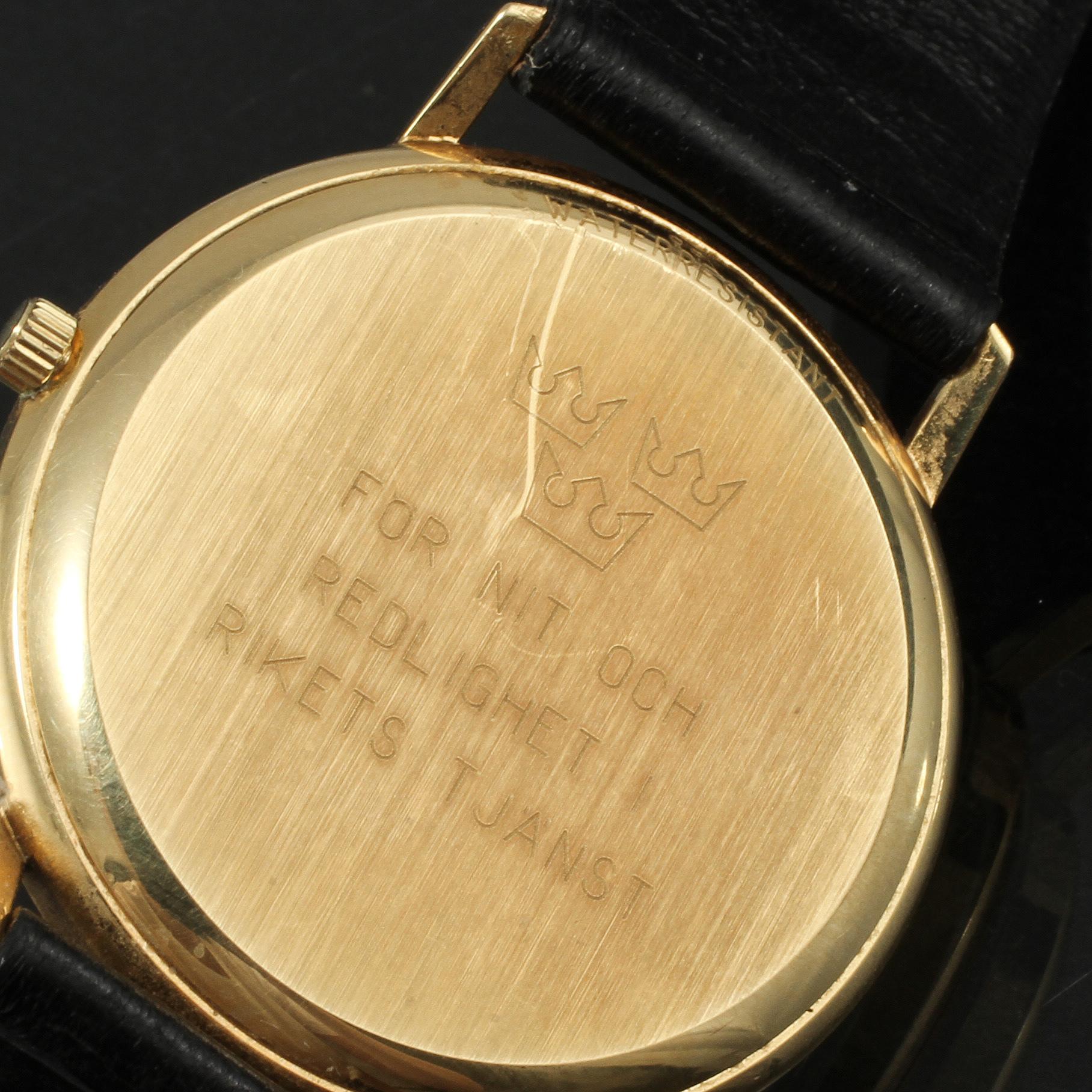 HERRARMBANDSUR, 18 k guld, "seastar", Tissot, 1900-talets senare del.