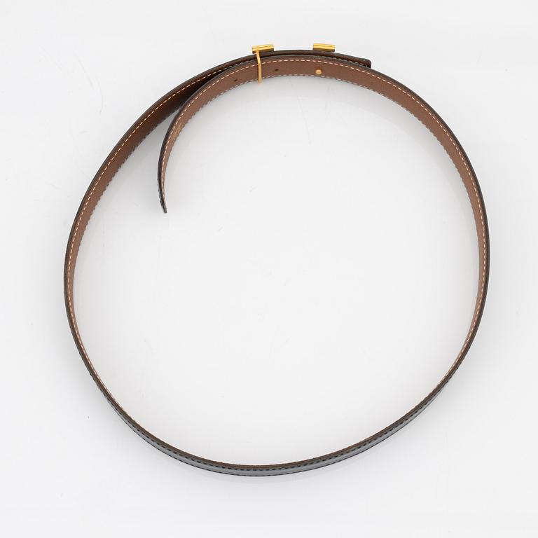 Hermès, A reversible leather and gold hardware 'Constance' belt from 1997.