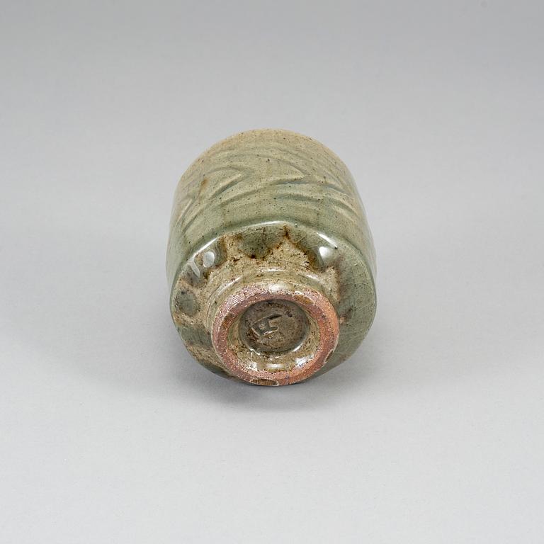 TATSUZŌ SHIMAOKA, a celadon glaze vase, signed.