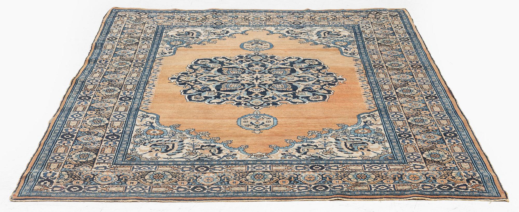 An antique 'Haj Jalili' Tabriz carpet, Northwest Persia, c. 185 x 141 cm.