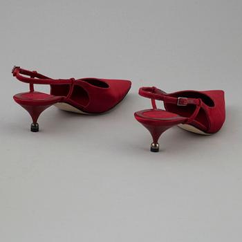 Red silk slingbacks by Sergio Rossi.