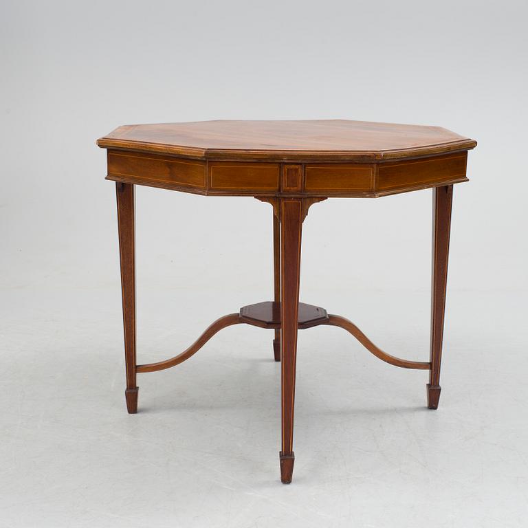 A 1920/30s Swedish Grace sofa, a pair of chairs, a pair of armchairs and a table veneered with mahogany.