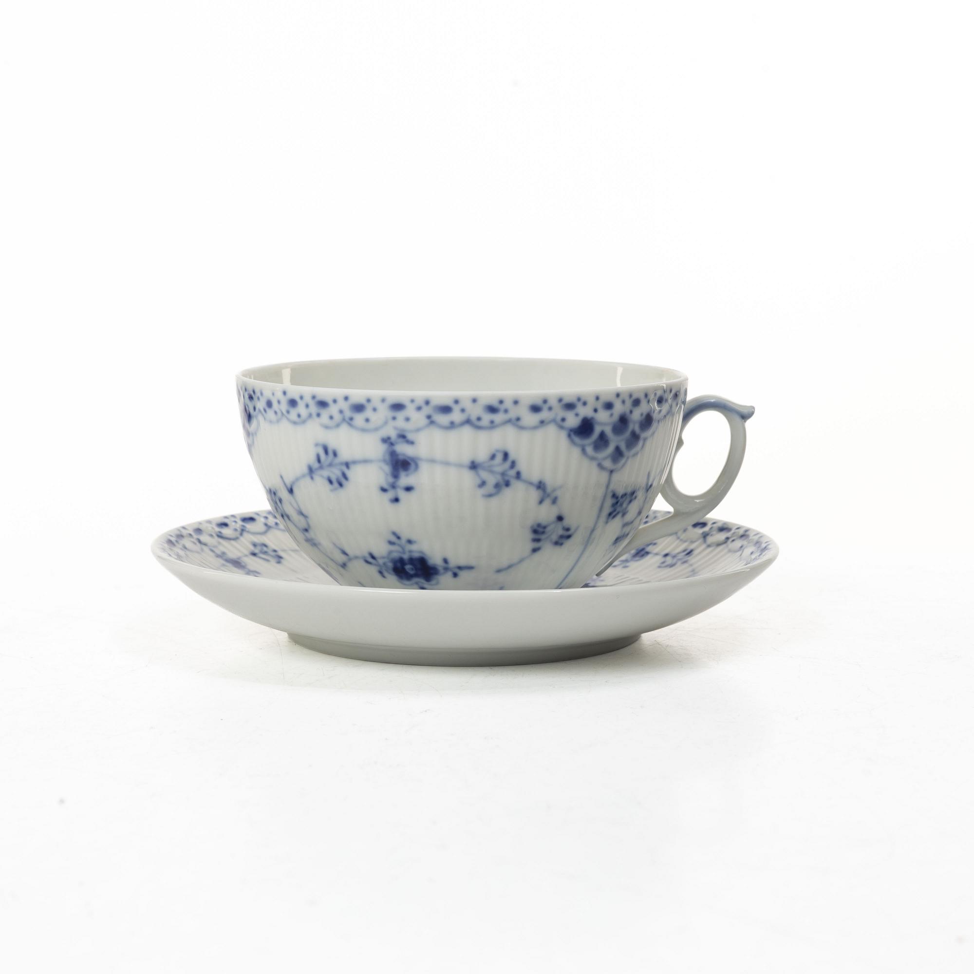 Royal Copenhagen, A 22 piece tea set, half laced and fukll laced, "Musselmalet", Denmark.