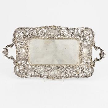 Two silver platters, presumably Wilhelm Weinranck, Hanau, and mock marks, Hanau, Germany, late 19th century.