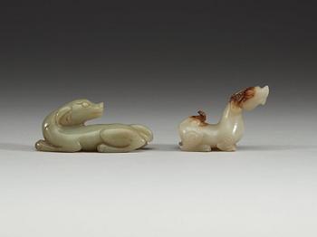 Two Chinese carved nephrite figures of a ram and a reclining dog.