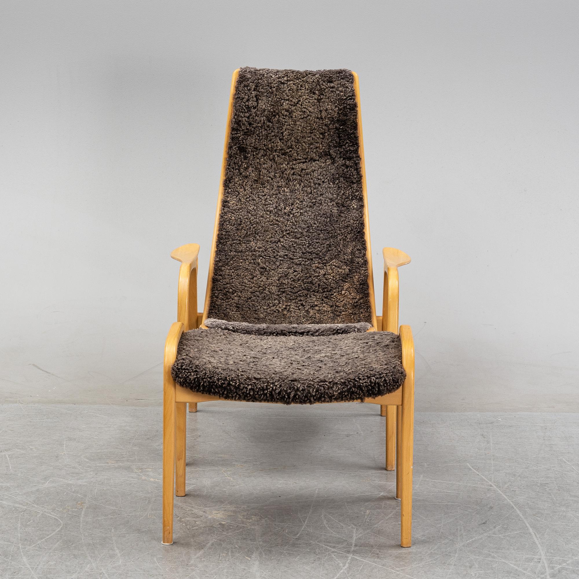 A 'Lamino' easy chair and stool by Yngve Ekström for Swedese, designed 1957.