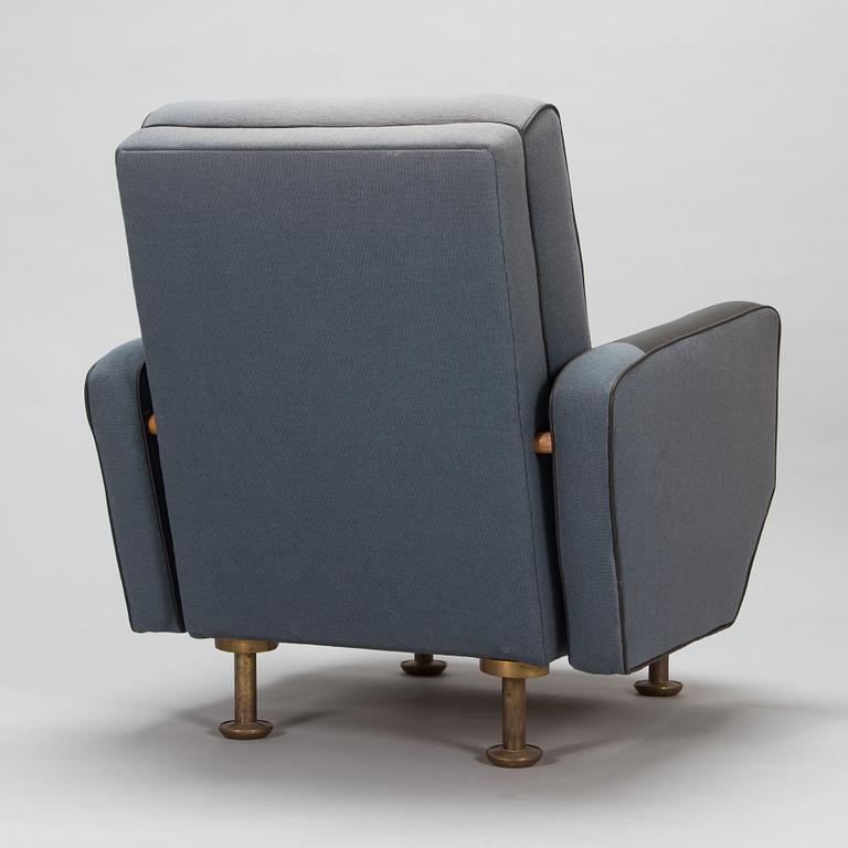 Alvar Aalto, a 1962 armchair made to order by O.Y. Huonekalu- ja Rakennustyötehdas A.B. and Valaistustyö.