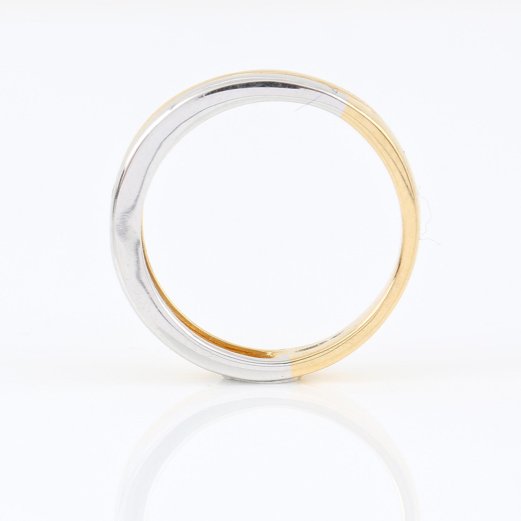 RING, Bliss, Italien, 18K gul/vitguld, två sammansatta band med diamant ca 0.01.