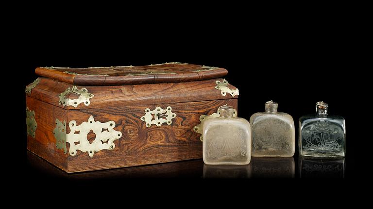 A set of eight armorial Swedish flasks, two baroque, presumably Kungsholms glasbruk, six later, 19th Century.