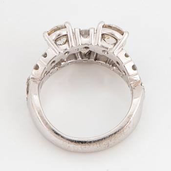 Round brilliant-cut diamond ring.