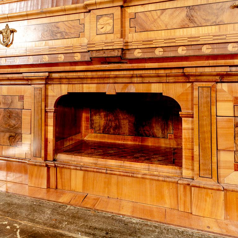 A German walnut and mahogany writing cabinet around 1800.