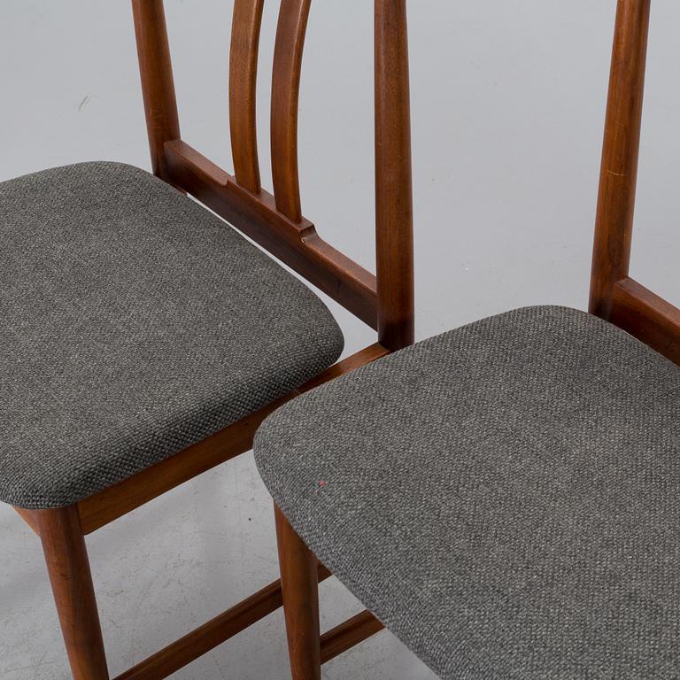 FOUR TEAK CHAIRS, second half of the 20th century.