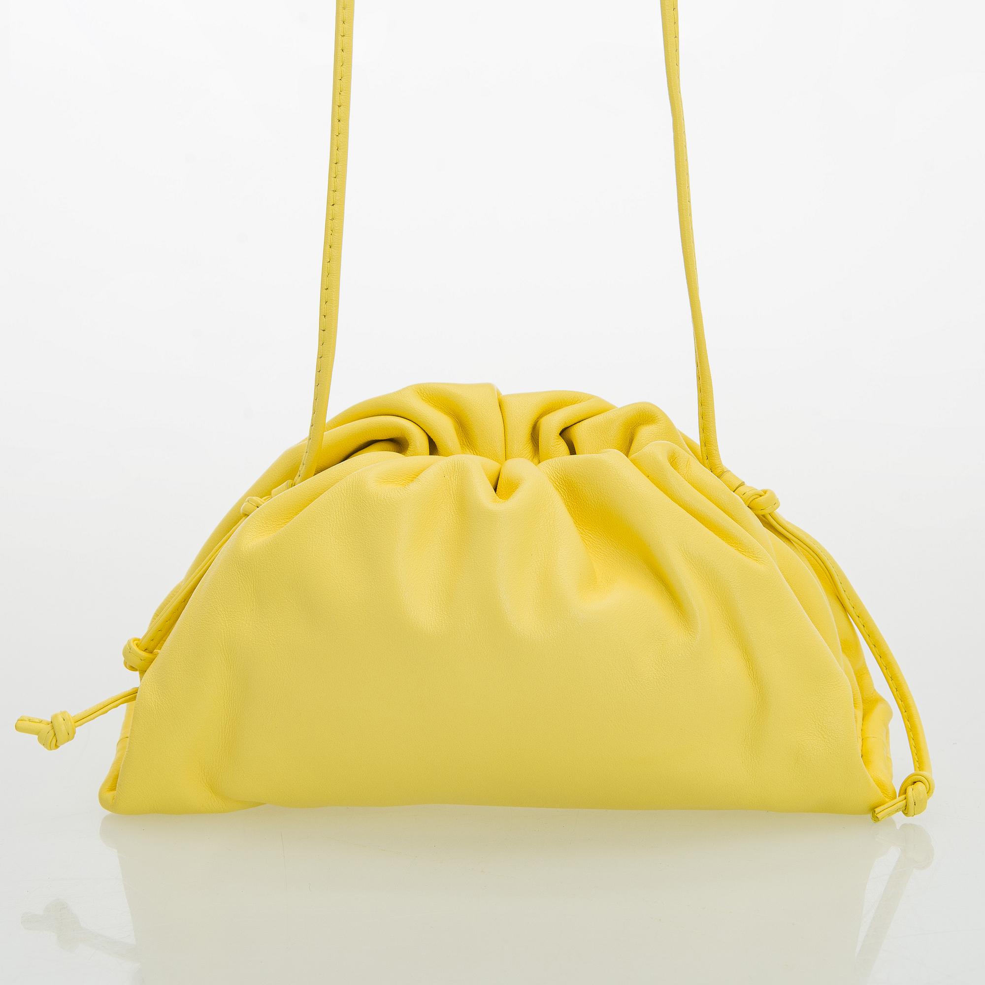 Bottega Veneta, a "Mini Pouch" bag.