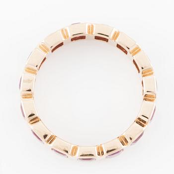 Ring, full eternity, 18K gold with rubies.