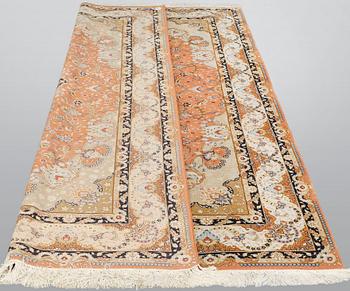 A part silk Tabriz carpet, so called 50 Raj, c 301 x 200 cm.