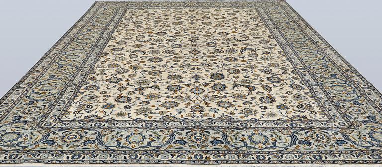 A Keshan carpet, 420 x 300 cm.