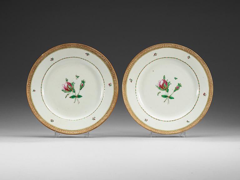 A pair of famille rose dinner plates, Qing dynasty, Qianlong (1736-95), dated 1789.