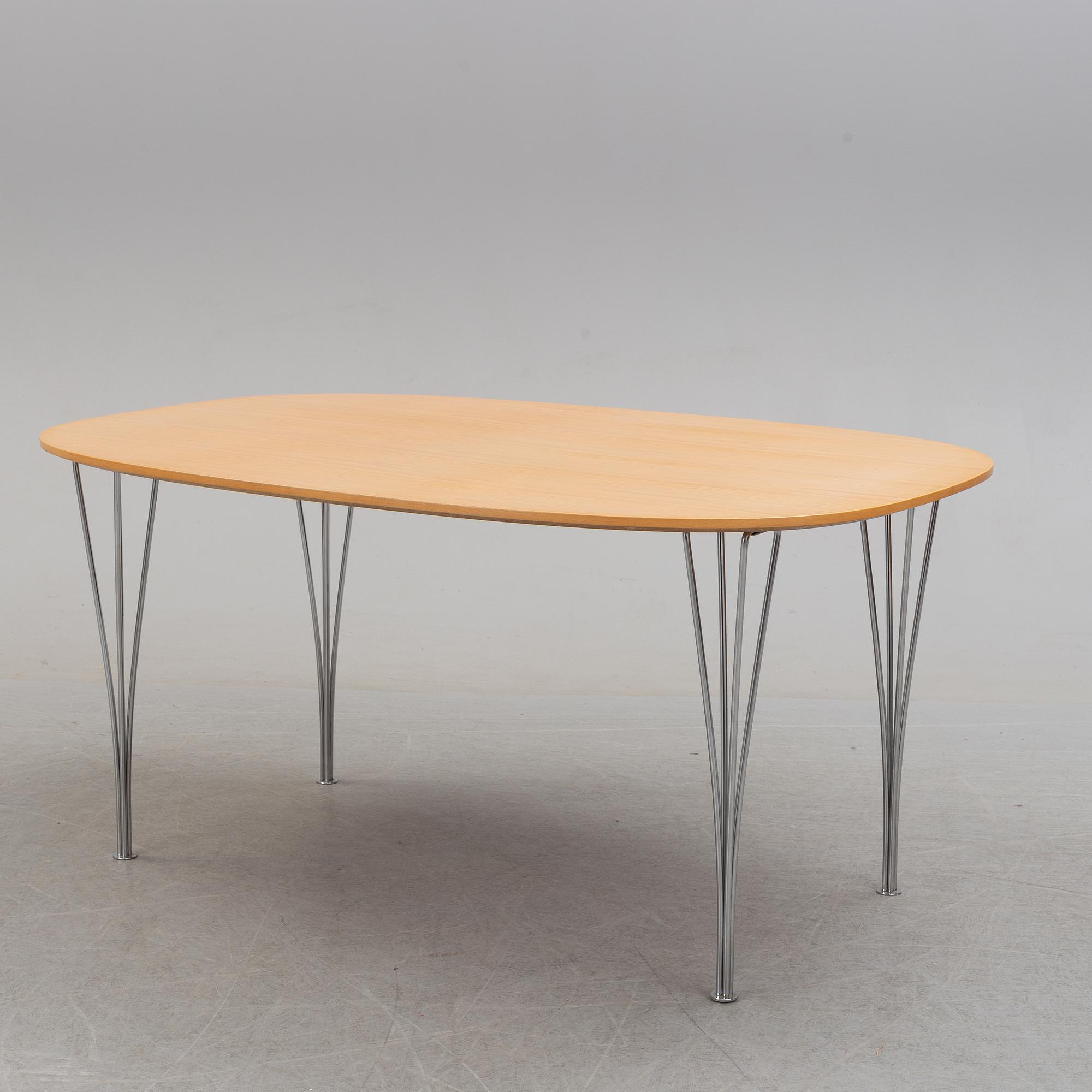 A 'Superellips' table by Bruno Mathsson and Piet Hein, Fritz Hansen, 1979.