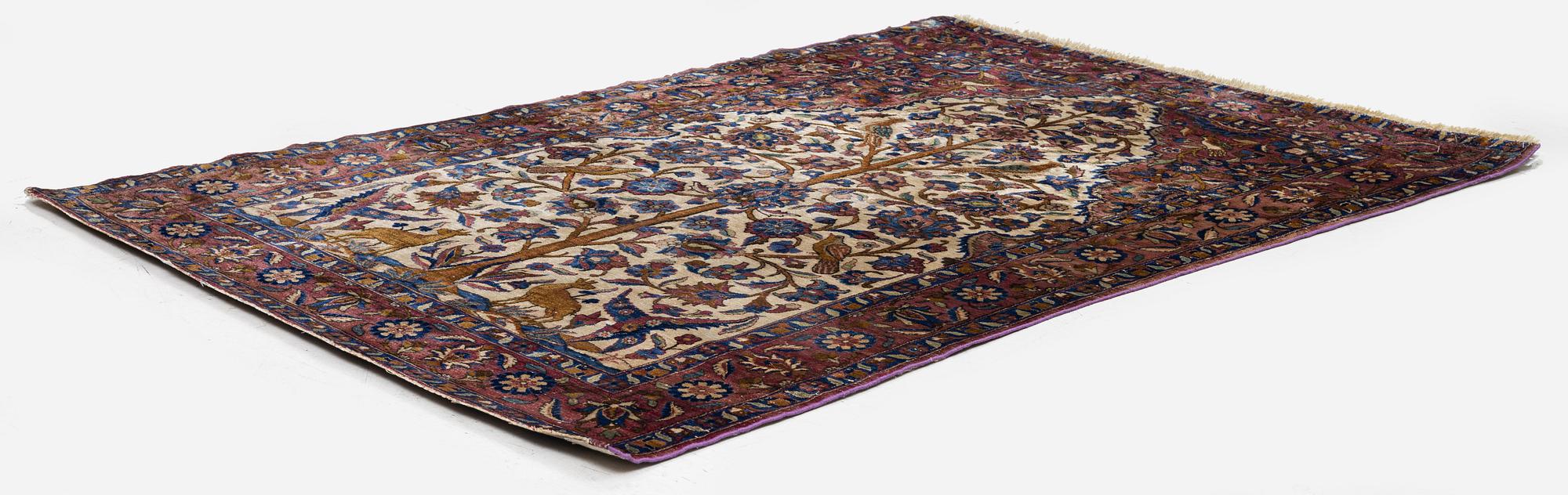 An Antique silk Keshan rug, Central Persia, c. 152 x 105 cm.