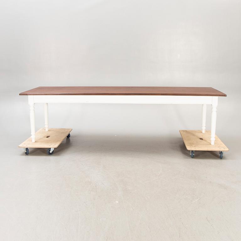 A painted and stained table 21st century.