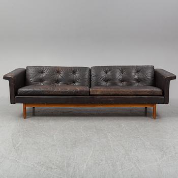 A black leather 1960s-70s sofa by Karl Erik Ekselius.