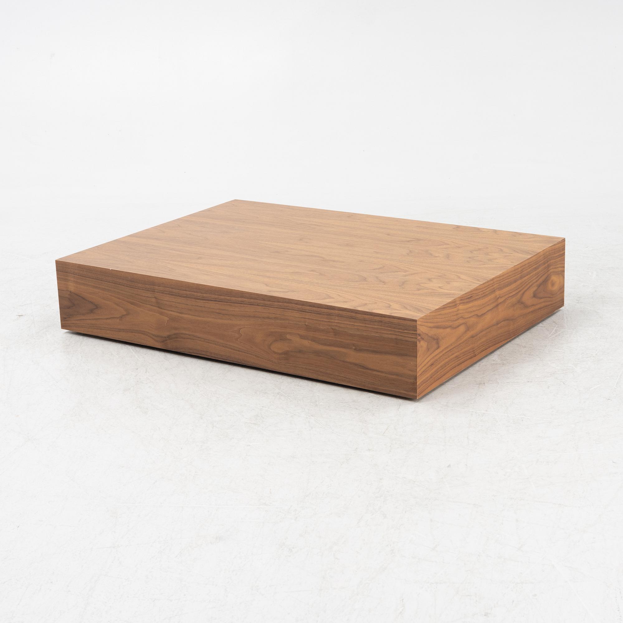 A 'Mass Wide' walnut veneered coffee table from New Works.