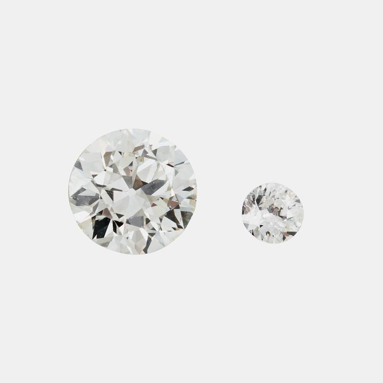 Two loose old-cut diamonds, 1.56 cts circa J/VVS, and 0.18 cts.
