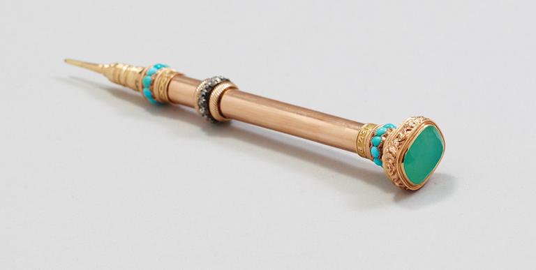 A 19th century probably French gold pen-holder.