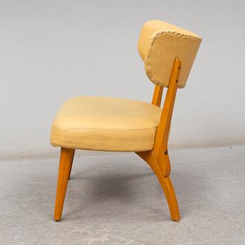 an armchair from the mid 20th century.