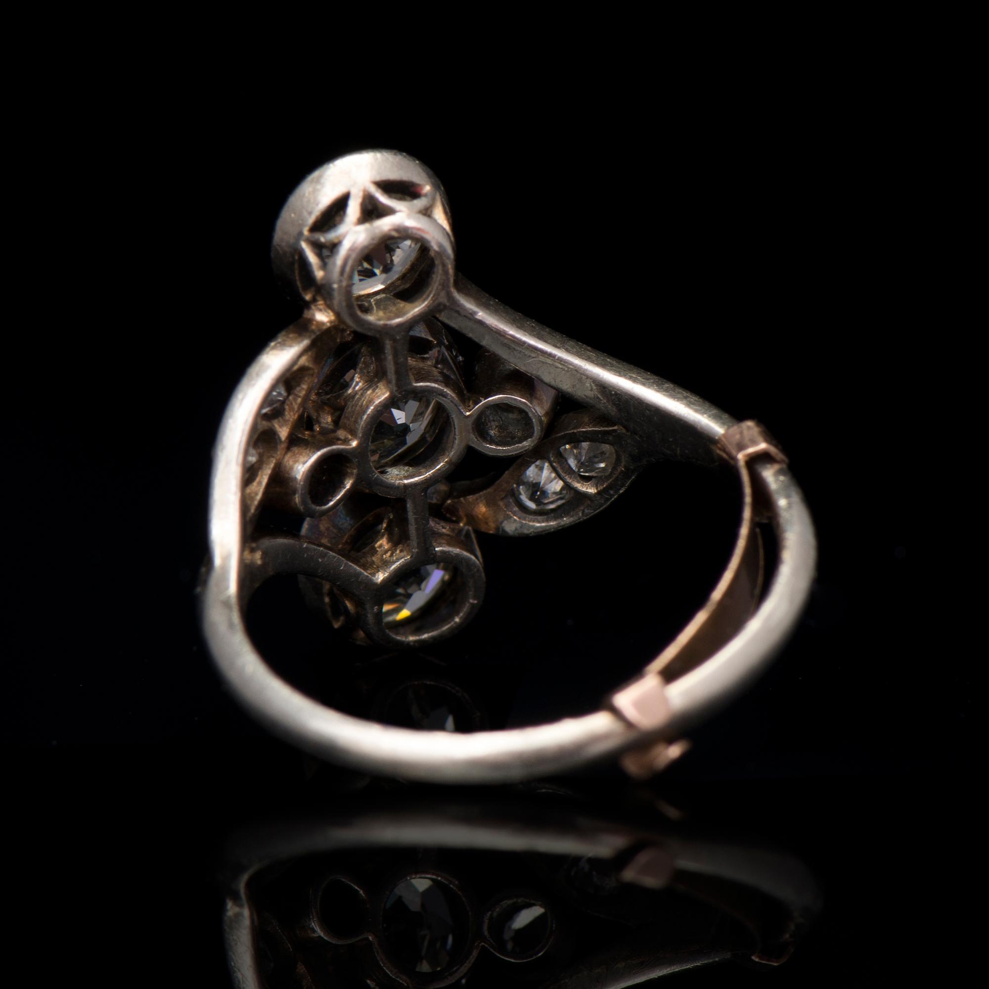 A RING, old cut diamonds, silver.