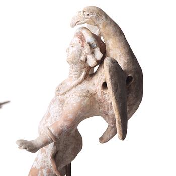 A pair of greek pottery figures of Zeus and Ganymede, Hellenistick period, circa 2nd Century B.C.