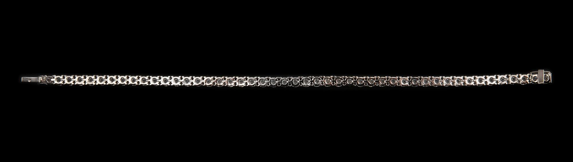 RANNEKORU, briljanttihiottuja timantteja n. 8.59 ct TW/vs-si. 18K valkokultaa. Pituus 18,5 cm, paino 16,5 g.