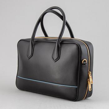 PRADA, a leather bag.
